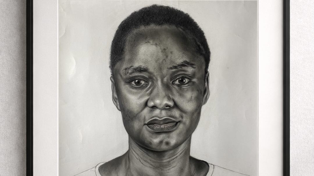 Charcoal portrait artwork by Nnamdi Odife